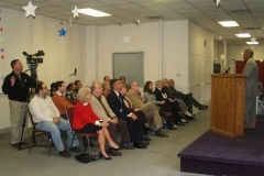 Liz Brown, Tom Wyss, Bob Morris, Joe Squadrito and crowd