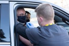 Indiana Governor Eric Holcomb receiving his COVID-19 vaccination