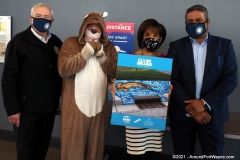 Mayor Tom Henry, Friendly the Otter, Irene Walters, and Kumar Menon