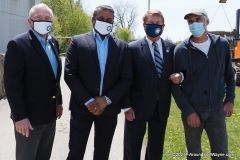 Mayor Tom Henry, Kumar Menon, Councilman Geoff Paddock, and Dan Wire