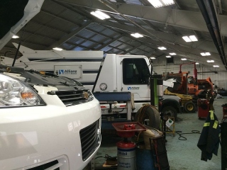 FWPD Police cruiser and street sweeper