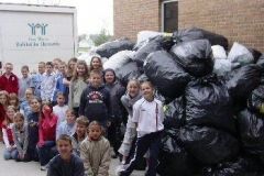 Kids collecting cans