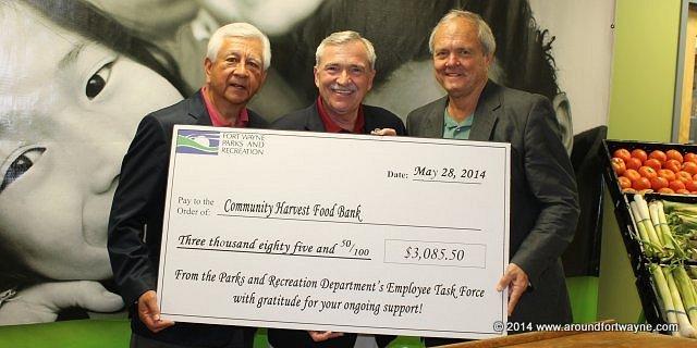 Photos and video from Community Harvest donation Steve Corona, Mayor Tom Henry and Al Moll