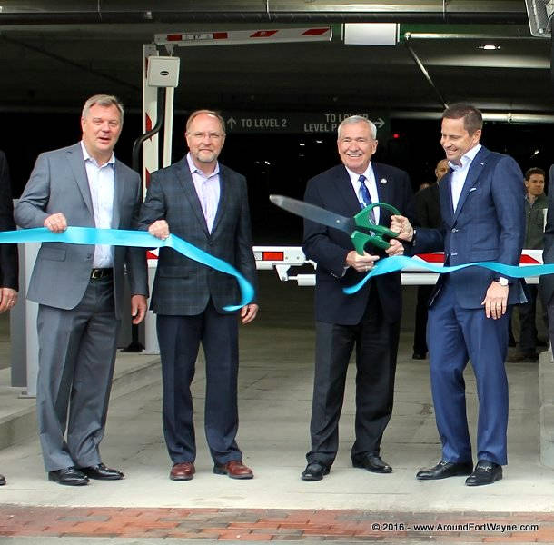 Cutting ribbon at the Skyline Garage Skyline Garage ribbon cutting on May 9, 2016