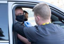 Holcomb receives COVID-19 vaccination