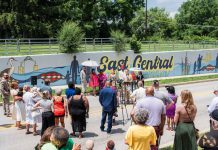 Mayor joins local artist to unveil mural in East Central Neighborhood